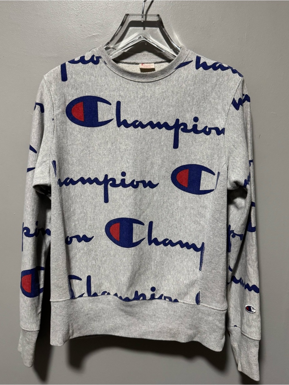 Champion Gray Crewneck with Blue Script and Red Logo Accents